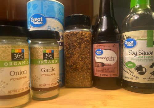 Soy sauce, Worcestershire sauce, and powdered seasonings for a spicy marinade