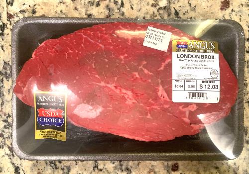London broil beef in a store tray
