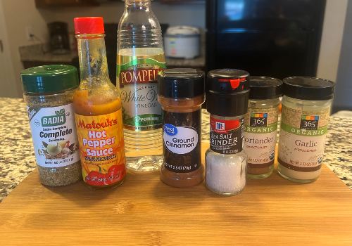 Hot sauce, vinegar, garlic, onion and ground spices