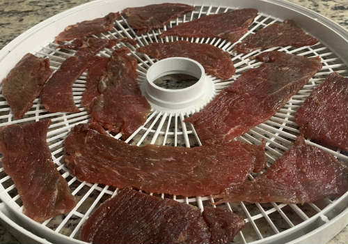 Beef placed on our dehydrator