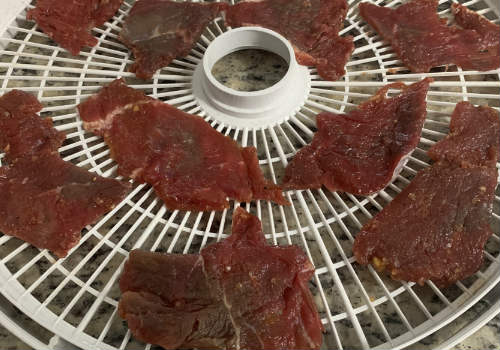  Beef placed on our dehydrator  