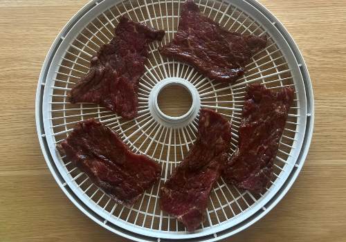 Beef placed on our dehydrator before drying