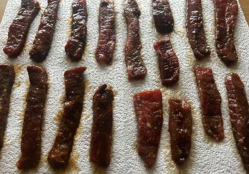 Beef strips on a paper towel