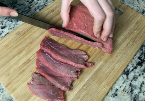 Cutting meat for Peppered beef jerky