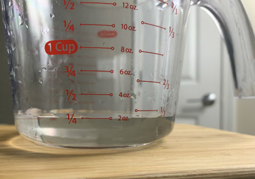 Measuring cup for keeping proportion