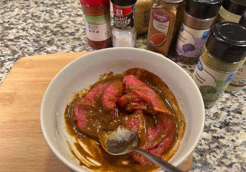 Mixing ingredients for a classic BBQ beef jerky