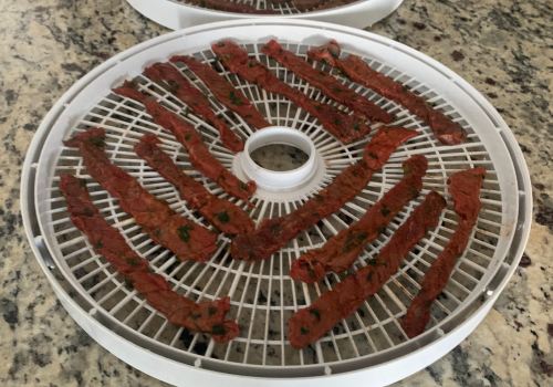 Our beef placed on a dehydrator for drying