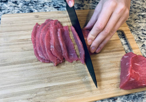  Slicing the beef for Sweet beef jerky