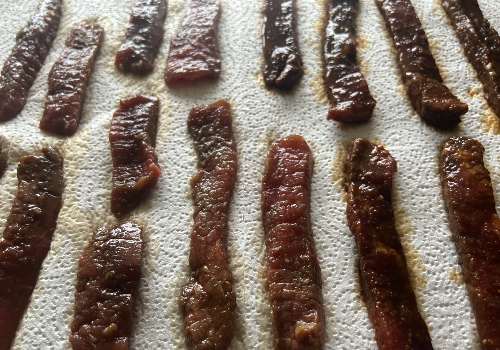 Place strips on paper towels to remove a marinade