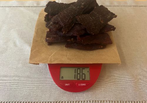 Weighing our beef jerky after dehydration in grams