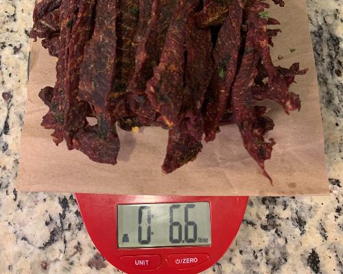 Weighing our meat after cooking in oz.