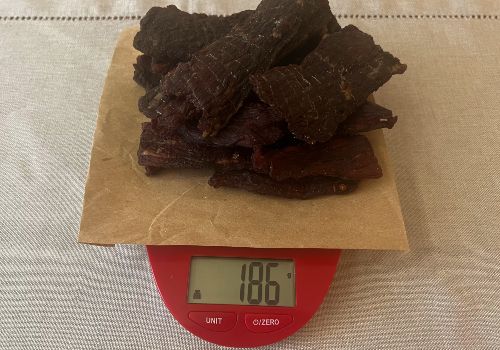 Weighing Simple Smoked beef jerky after dehydration